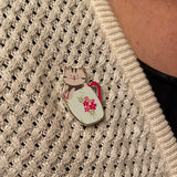 A Cup of Kitty Magnetic Needle Minder (doubles as a pin!)